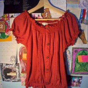 Orange ruffle sleeved shirt